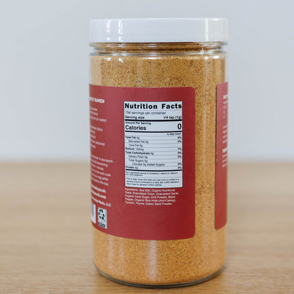 Spicy ramen seasoning packet from Clean Monday Meals, featuring vibrant red and orange spices in a clear plastic bag.