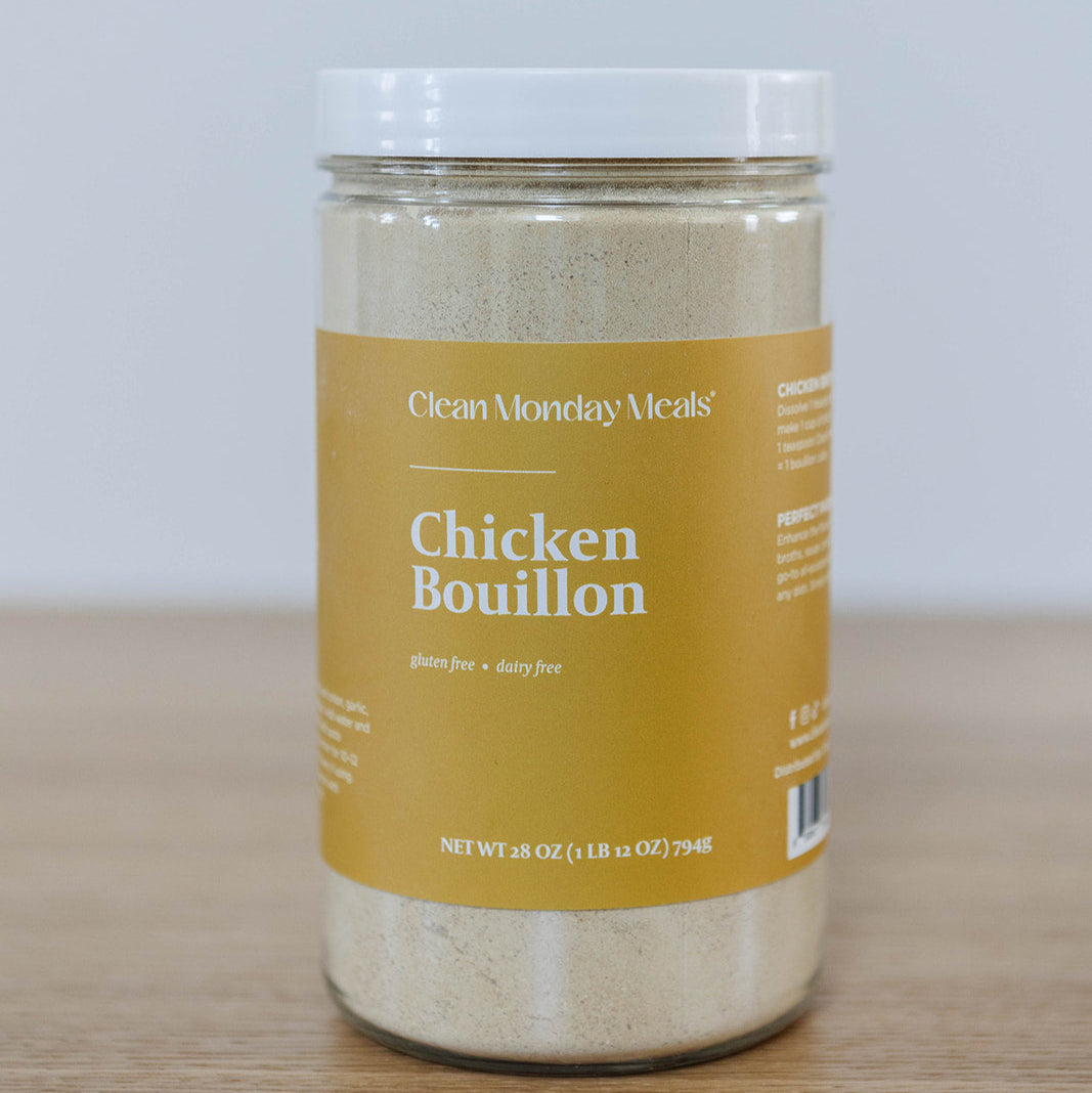 Clean Monday Meals chicken bouillon seasoning jar with label, used for enhancing savory dishes.