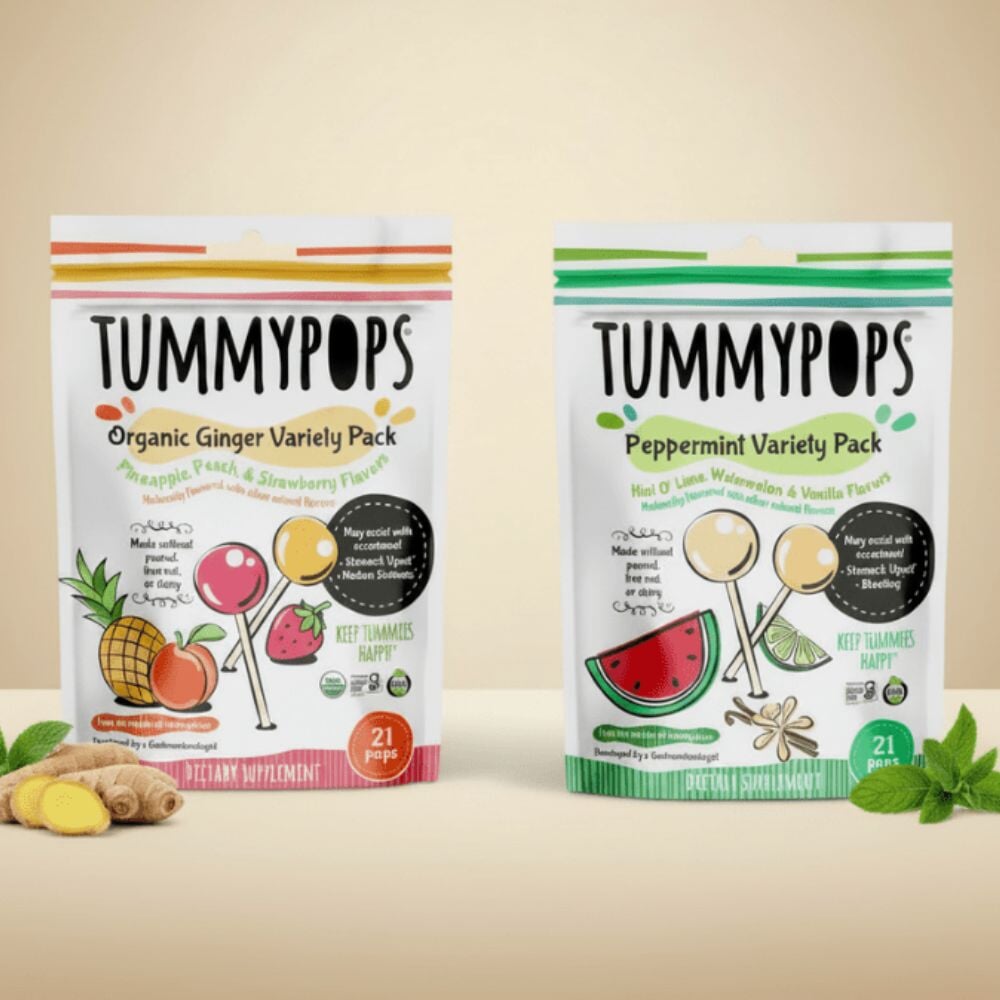 Tummydrops Savings Bundle featuring assorted natural herbal drops in a clear glass jar and colorful packaging.