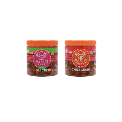 Two 7oz jars of Mr Bing Chili Crisp from Mr Bing Foods, showing the jar labels and spicy chili oil inside