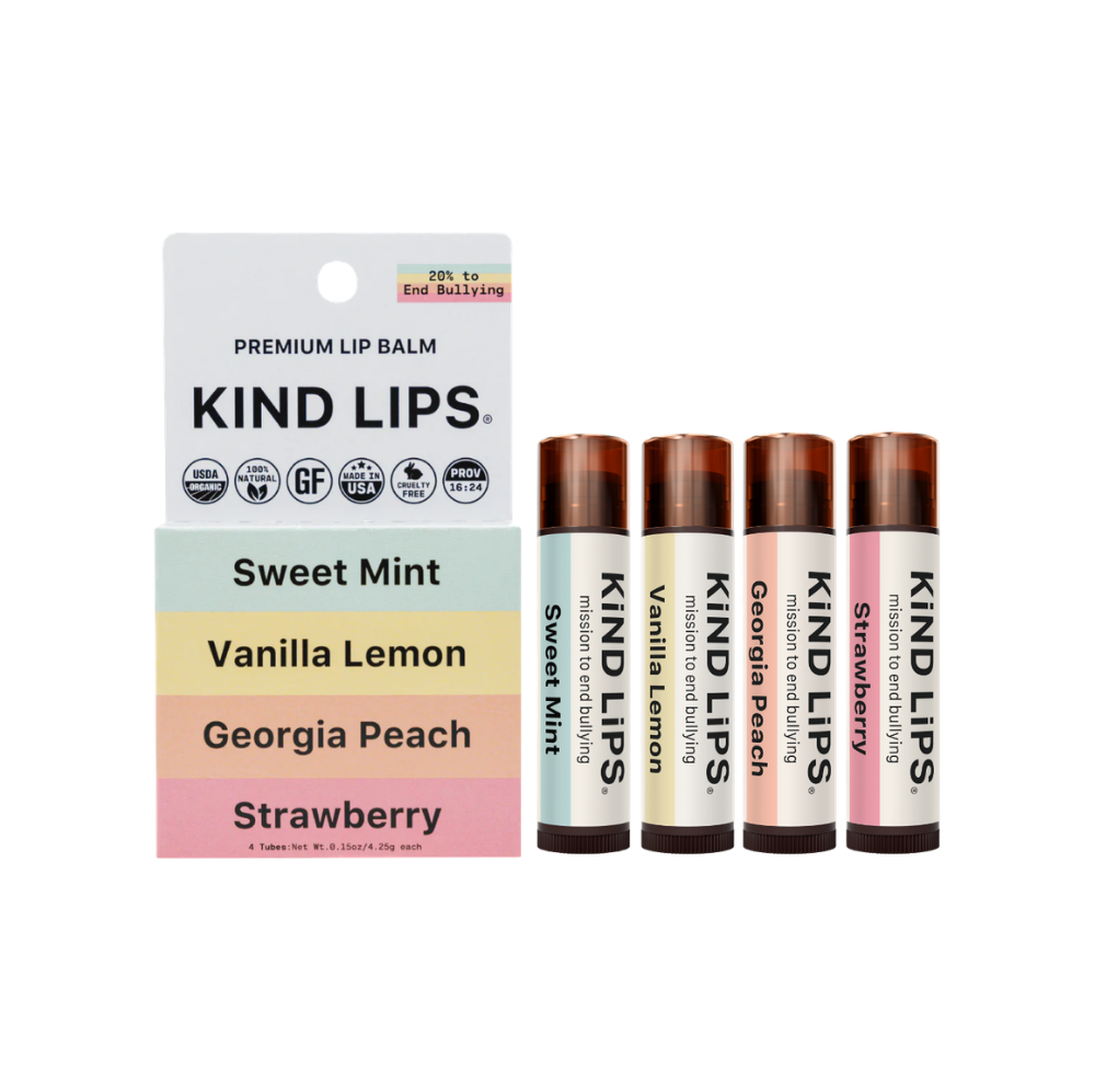 Assorted organic lip balms from Kind Lips in a 4-pack, featuring natural ingredients and colorful packaging.