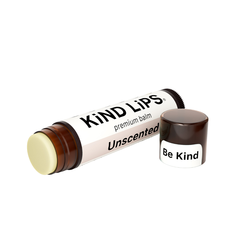Unscented organic lip balm by Kind Lips, showing a tube with a clear label and natural ingredients visible on the packaging.