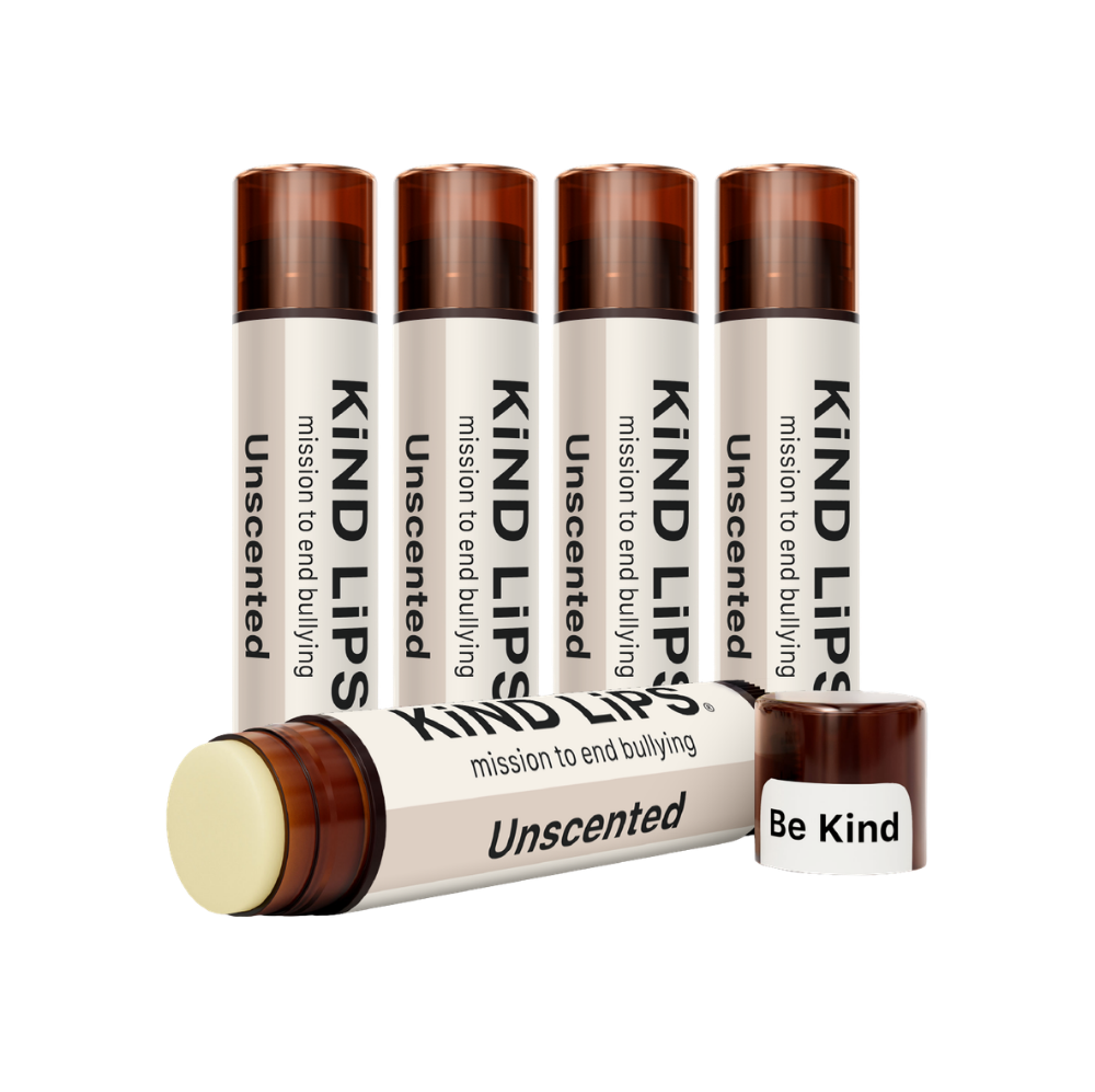 Kind Lips unscented organic lip balm in a small container, showing the natural, nourishing product for soft, moisturized lips.