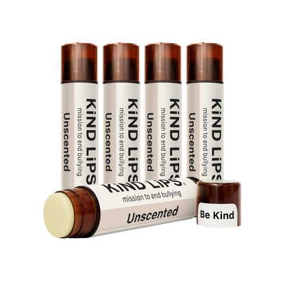 Kind Lips unscented organic lip balm in a small container, showing the natural, nourishing product for soft, moisturized lips.