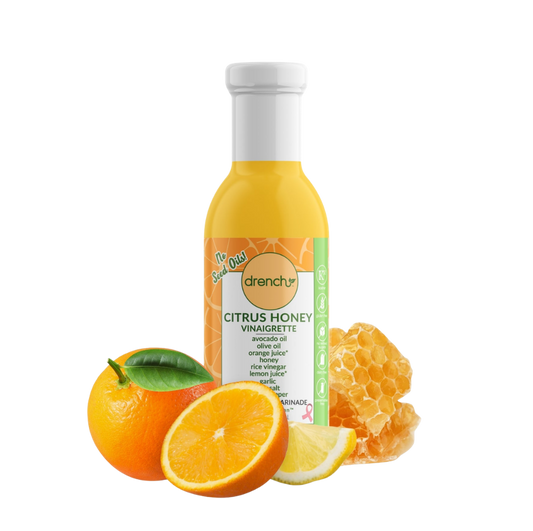 Drench Citrus Honey Vinaigrette bottle with label showing fresh citrus fruits and honey drizzled, perfect for salads.