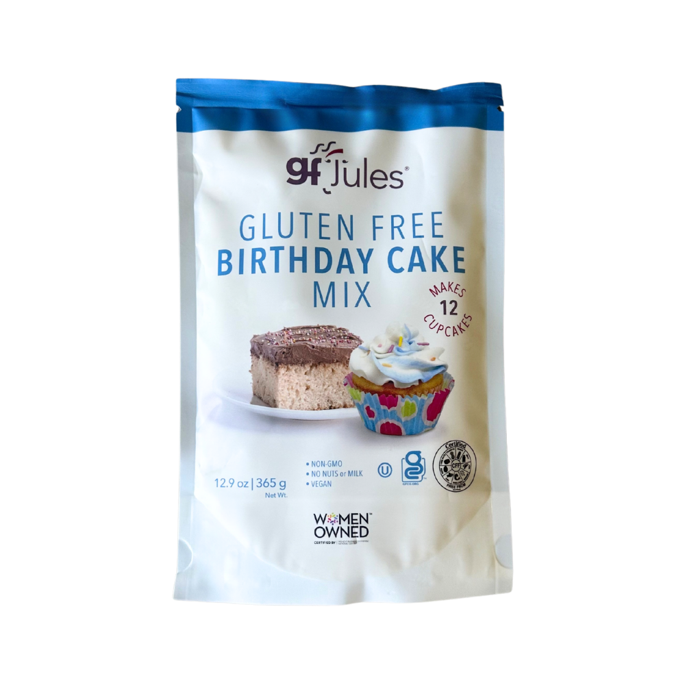 gfJules gluten-free birthday cake mix in a colorful box with images of a decorated cake and baking ingredients.