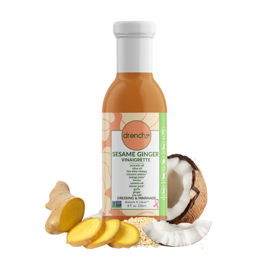 Drench Sesame Ginger Vinaigrette bottle with label, featuring a clear glass container and a sesame ginger flavor on a white background.