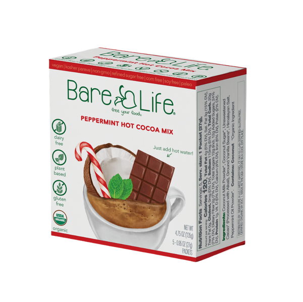 Bare Life dairy-free peppermint hot cocoa mix 5-pack, showing individual cocoa packets with mint flavor and branding on the packaging.