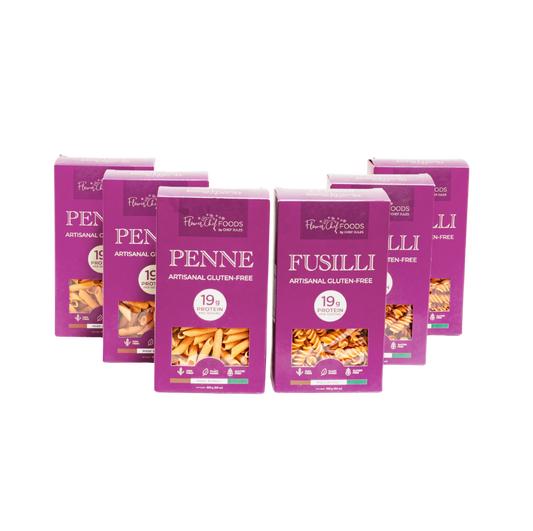 Six-pack of Flower Chef Foods artisanal gluten-free pasta with penne and fusilli shapes on a white background