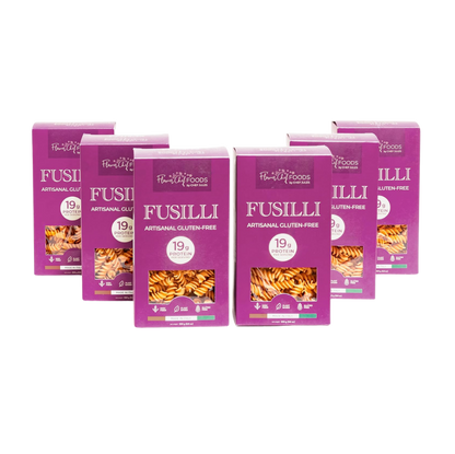 Six-pack of Flower Chef Foods gluten-free high-protein fusilli pasta in clear packaging, ready for cooking.