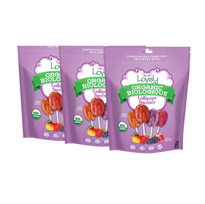 Assorted organic lollipops from Lovely Candy Company with colorful wrappers on a white background.