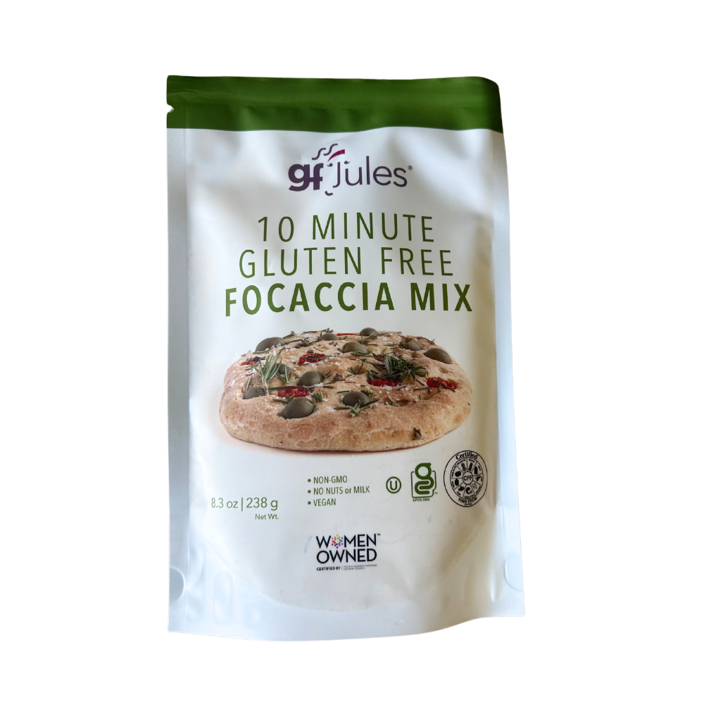gfJules gluten-free focaccia mix in a bowl, showing the ready-to-bake focaccia dough with herbs and olive oil on top.