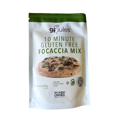 gfJules gluten-free focaccia mix in a bowl, showing the ready-to-bake focaccia dough with herbs and olive oil on top.