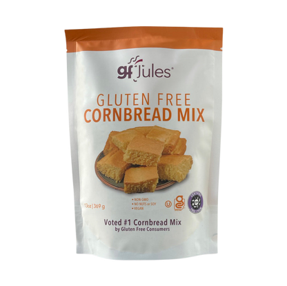 gfJules gluten-free cornbread mix in a box with a prepared cornbread slice on a plate, ready to serve.