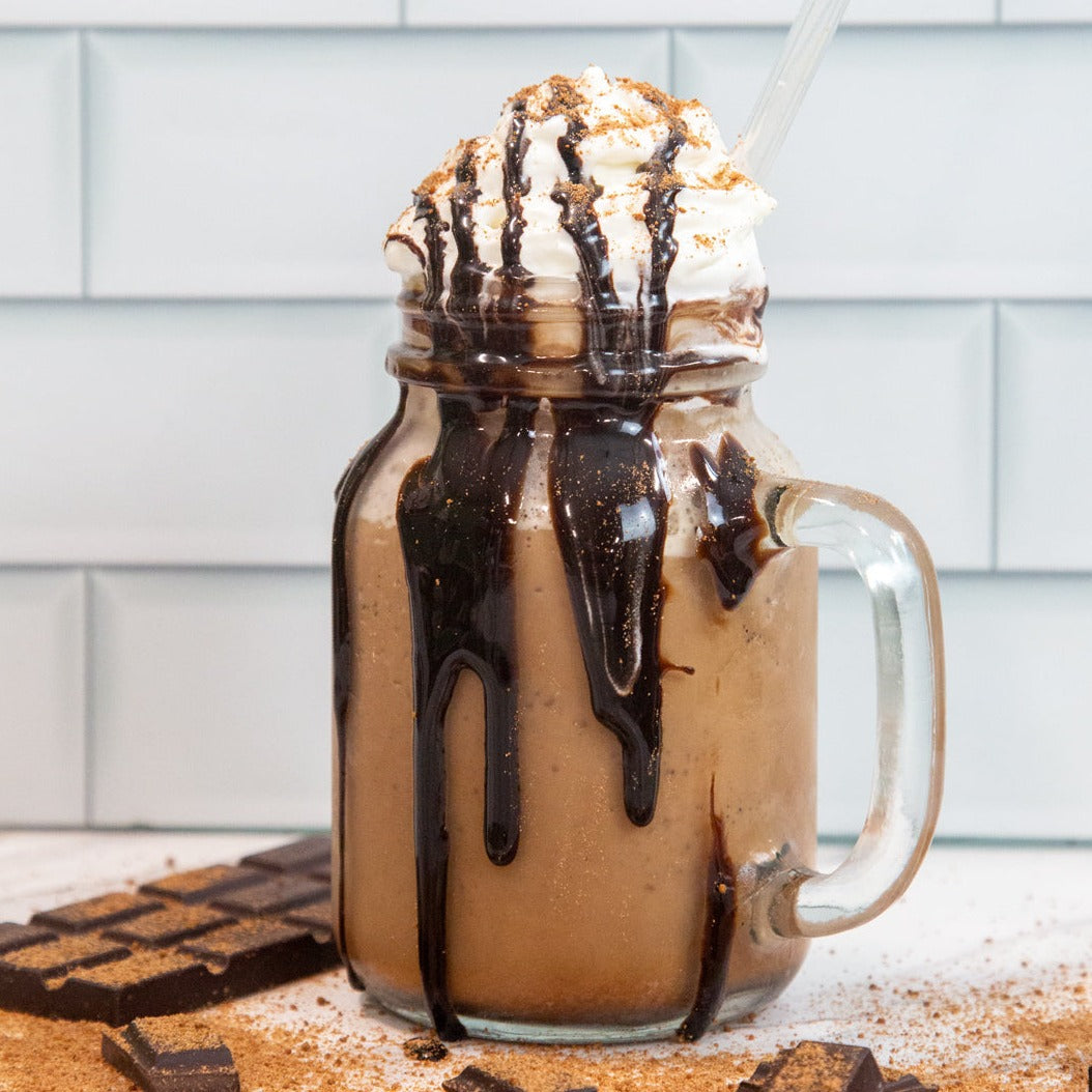 Dairy-free frozen hot cocoa mix by Bare Life, vegan organic hot chocolate with a gourmet frappe style, served cold.