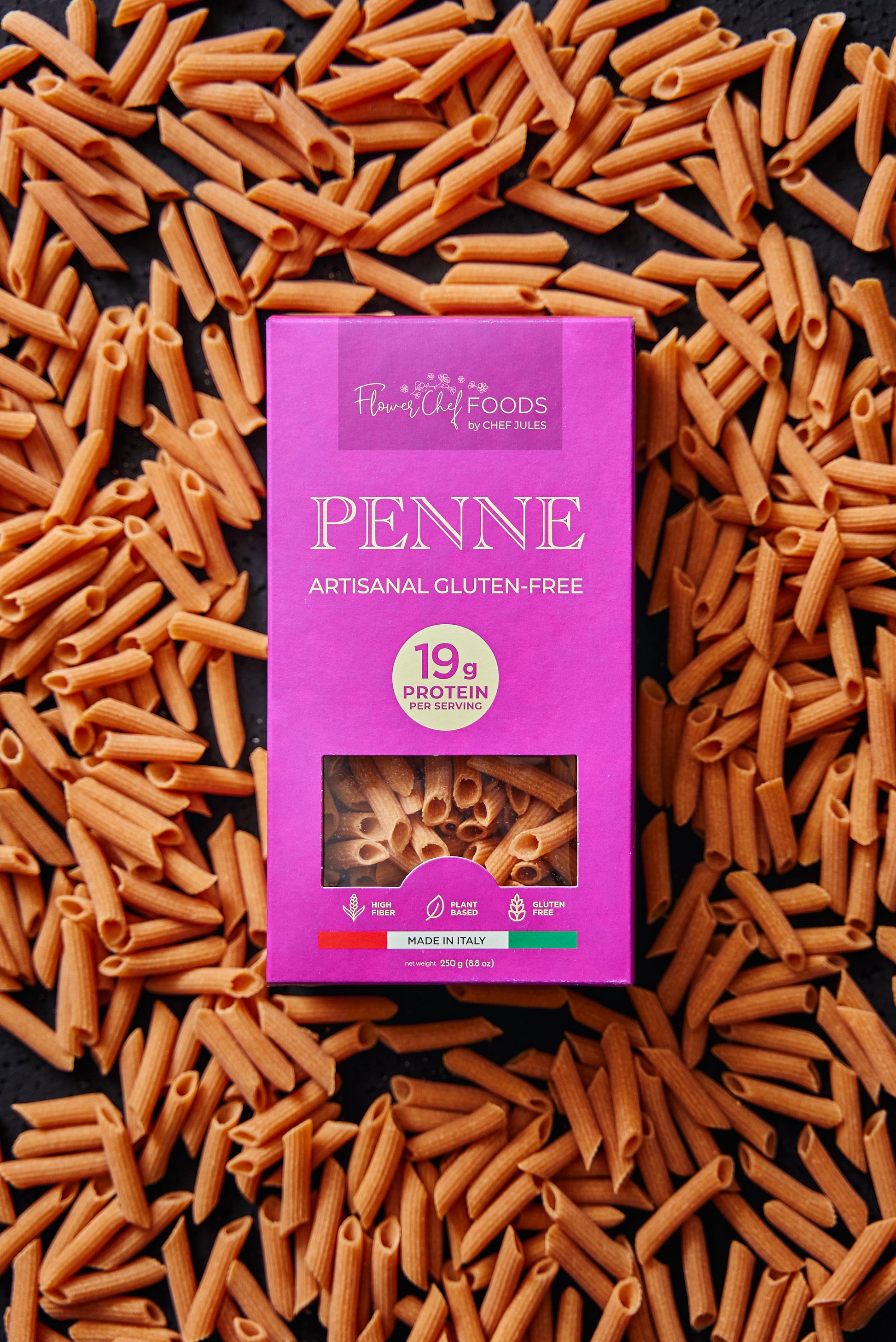 High protein Flower Chef Foods Penne pasta in a bowl, showcasing the pasta's shape and texture.