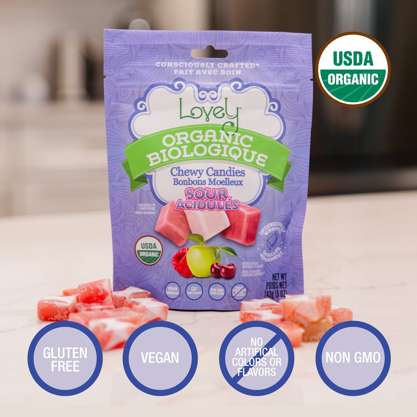 Organic sour chewy candies by Lovely Candy Company featuring colorful fruit flavors and vibrant packaging.
