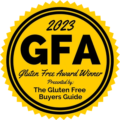 gfJules gluten-free cornbread mix in a colorful box with a scoop of baked cornbread on a plate.