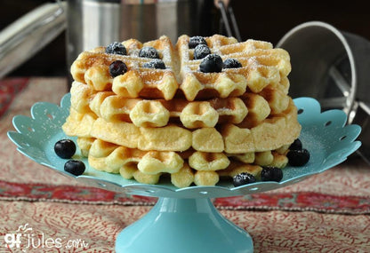 Gluten-free pancake and waffle mix by gfJules in a resealable bag with a scoop, ready for cooking.