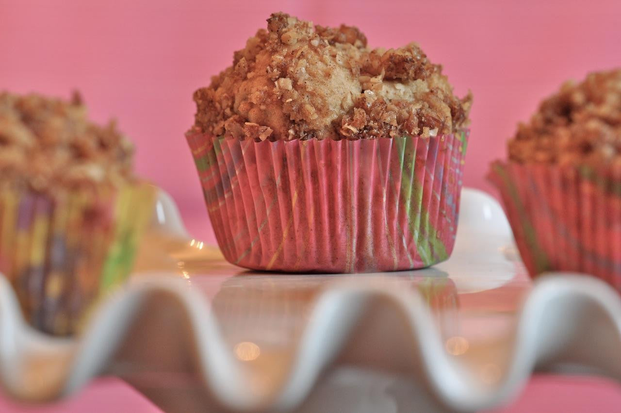 Gluten-free gfJules muffin mix box with baked muffins and ingredients on a white background