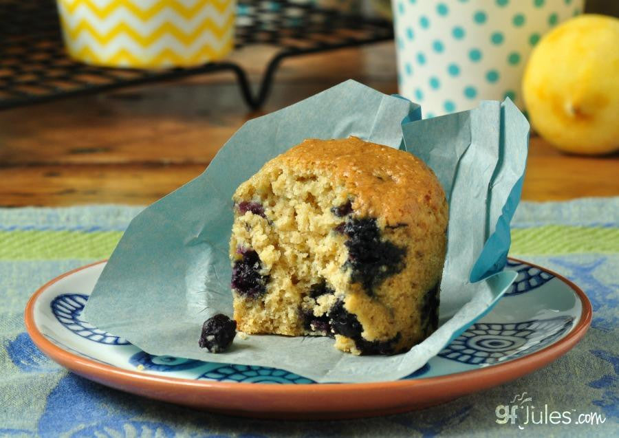Gluten-free muffin mix by gfJules with a bag of mix, showing freshly baked muffins on a cooling rack.
