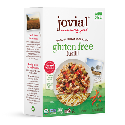Jovial gluten-free brown rice fusilli pasta in family size package by Jovial Foods, Inc, shown in a clear, close-up view.