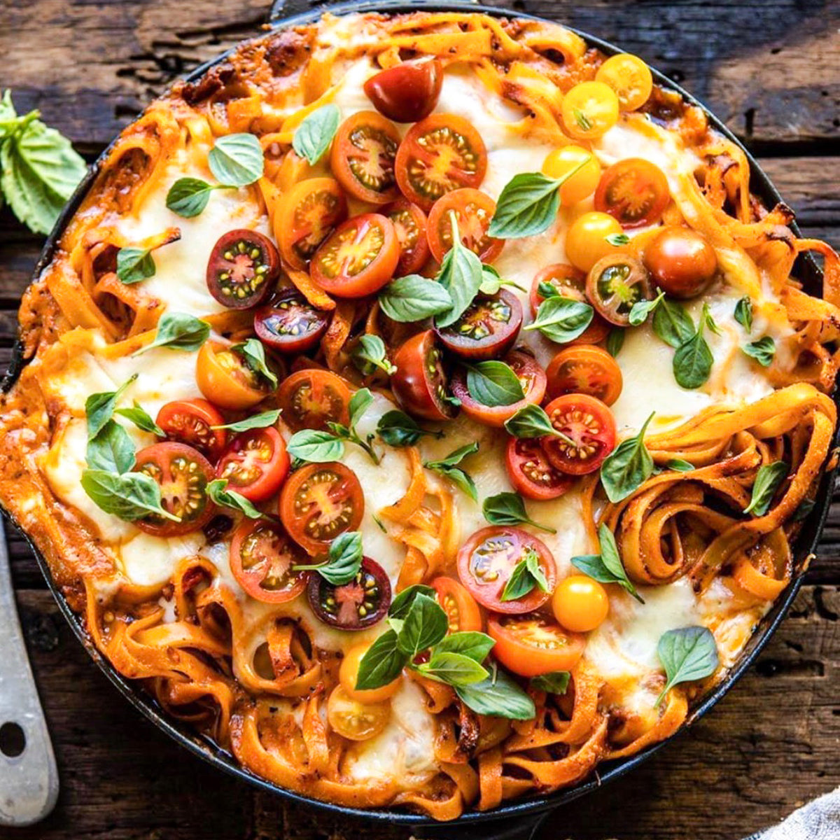 Taste Republic gluten-free linguini pasta in a 6-pack, showcasing cooked linguini noodles served with a fresh vegetable sauce.