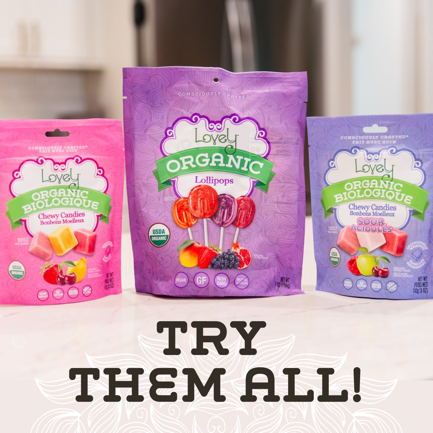 Colorful organic lollipops from Lovely Candy Company, displayed with assorted flavors and vibrant wrappers.