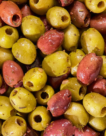 Mixed Mediterranean herb medley snack pack by Freestyle Snacks, featuring colorful, seasoned snack mixes in a clear container.