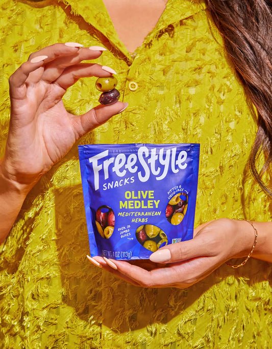Mixed snack medley with Mediterranean herbs from FreeStyle Snacks, featuring a variety of seasoned, colorful snack pieces.