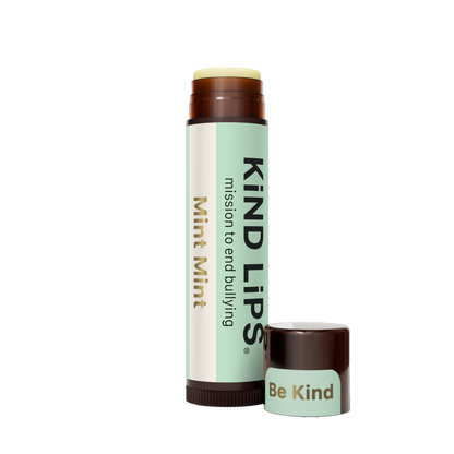 Kind Lips Mint Mint organic lip balm with mint flavor, shown with the cap off, highlighting the smooth lip balm texture.