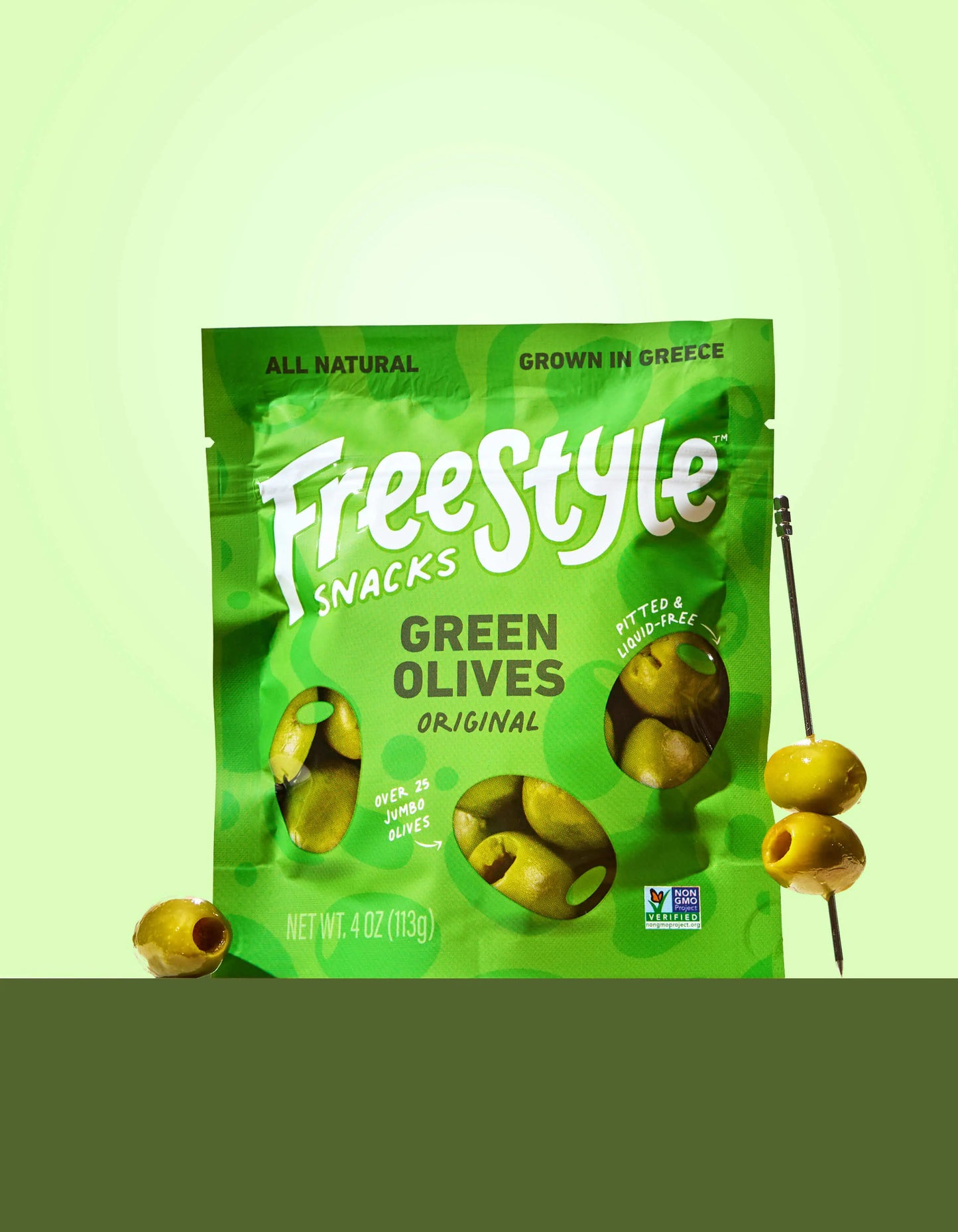 Bowl of Freestyle Snacks Green Olives in their original flavor, showcasing the vibrant green olives in a clear dish.