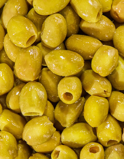 Jar of FreeStyle Snacks Green Olives in brine, showing the original flavor with green olives visible inside the clear container.