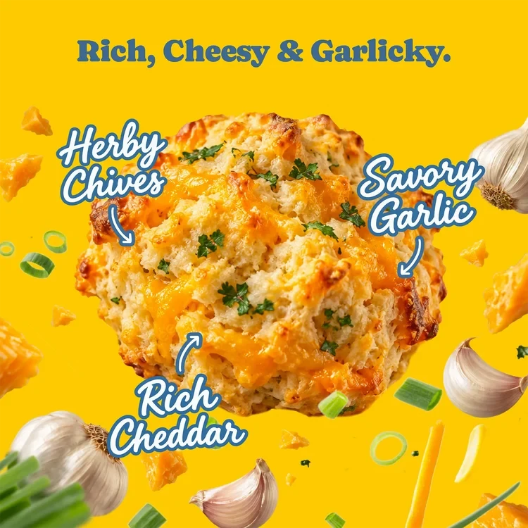 Pamela's Products Cheddar Garlic Biscuit Mix bundle with multiple packages of biscuit mix in a clear view