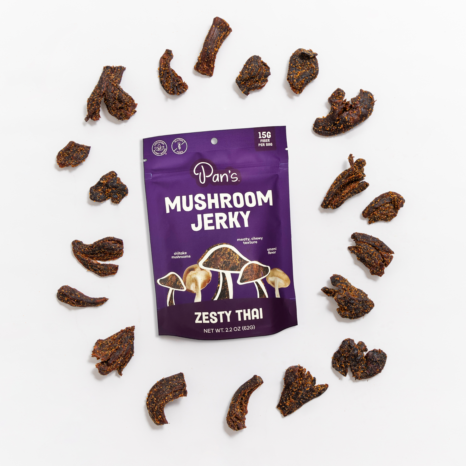 Close-up of Pan's Zesty Thai Mushroom Jerky, a savory snack food with sliced mushrooms seasoned with Thai spices.