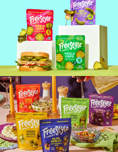 Assorted olives and pickles in a party snack pack by Freestyle Snacks, ideal for sharing at gatherings and celebrations.