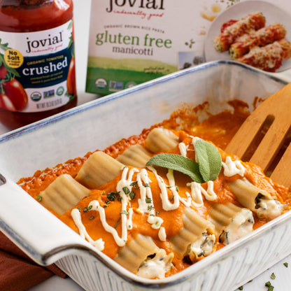 Gluten-free brown rice manicotti pasta with pumpkin and sage filling, made by Jovial Foods, Inc, ready for cooking.