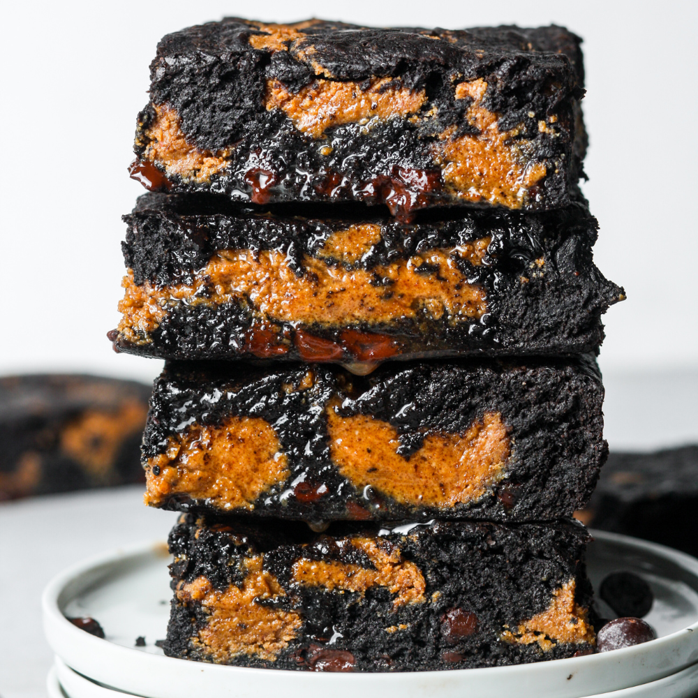 Box of Sweet Addison's Brownies featuring a variety of freshly baked, chocolatey brownies in a decorative gift box.