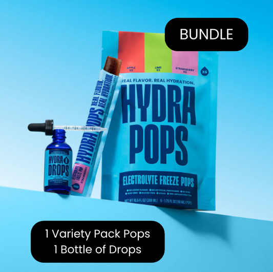 Hydra Hydration The Hydra Duo drops and pops in a clear container with colorful candies and small drop-shaped supplements.