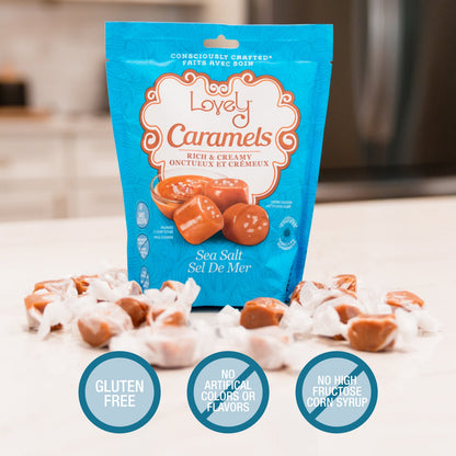 Close-up of Lovely Candy Company sea salt caramel candies in a bowl, showcasing their rich caramel texture and sea salt topping.