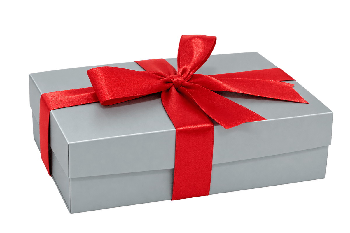 Silver gift box with red satin bow containing My Dad's Cookies Holiday Bakery Favorites cookie assortment.