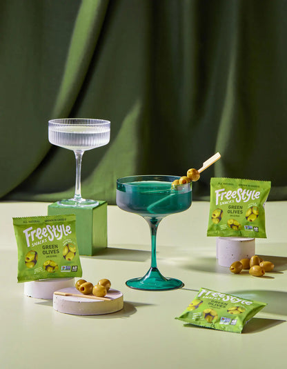 Assorted single-serve snack packs from Freestyle Snacks, featuring a variety of food and beverage options in colorful packaging.