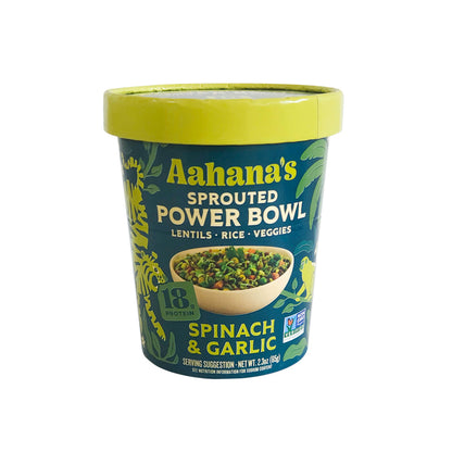 A bowl of Aahana's Naturals Sprouted Power Bowl with fresh spinach and garlic, showcasing healthy ingredients in a vibrant presentation.