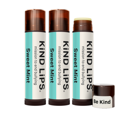 Kind Lips Sweet Mint organic lip balm in a small container, featuring a mint-scented, nourishing balm for moisturized lips.