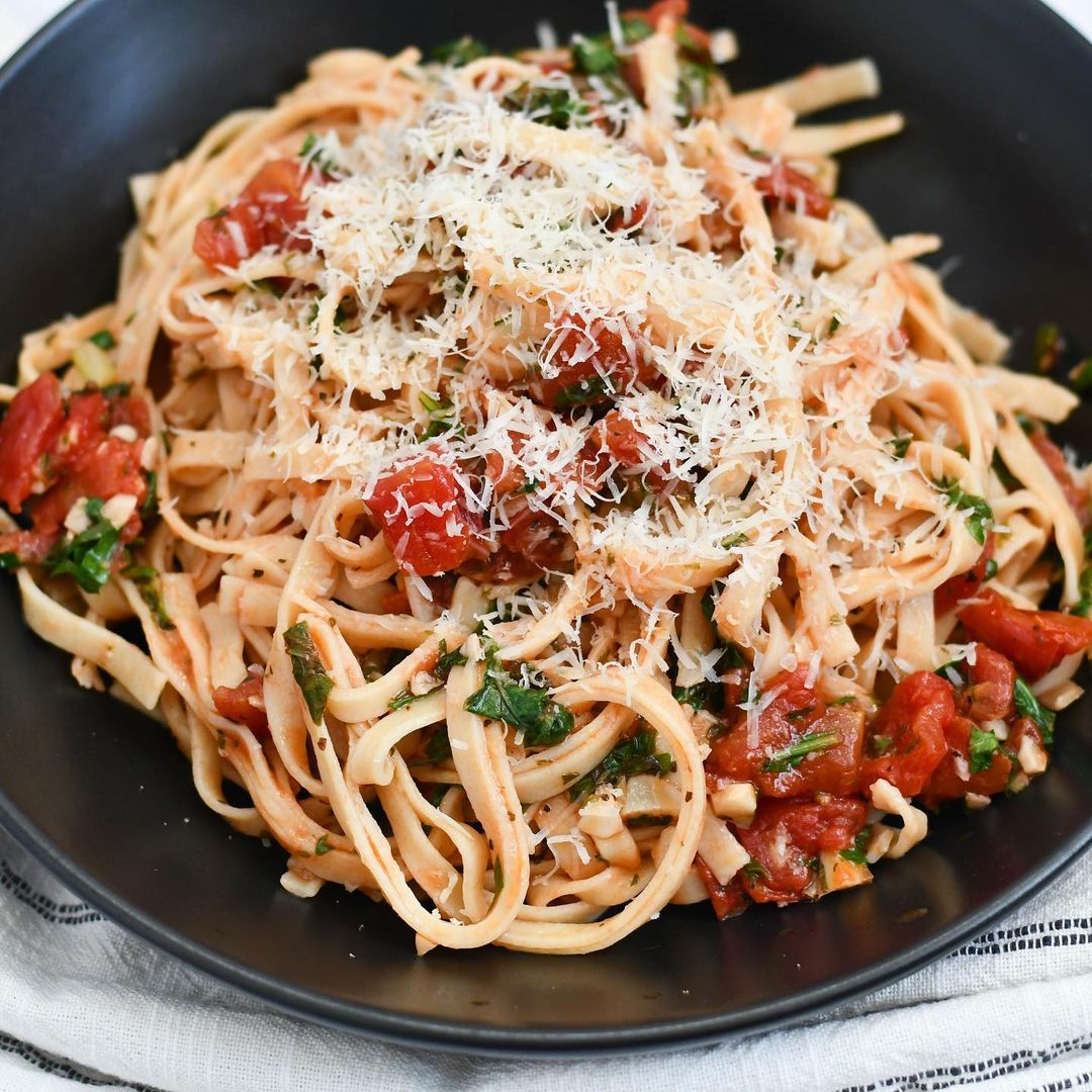 Cooked Taste Republic gluten-free chickpea linguini served on a plate with vegetables and herbs, highlighting organic pasta.