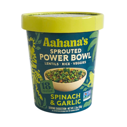 A bowl of Aahana's Naturals Spinach & Garlic Sprouted Mung Beans and Rice Khichdi, showcasing fresh ingredients in a white bowl.