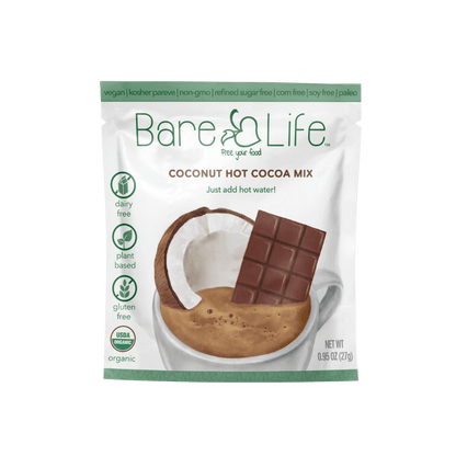 Bare Life dairy-free coconut hot cocoa mix packets, 20-pack, with chocolate powder and coconut flavor in individual sachets.