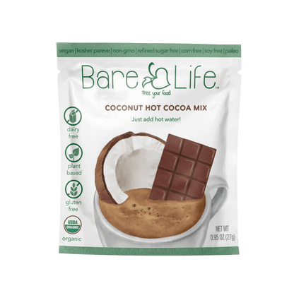 Bare Life dairy-free coconut hot cocoa mix single serving packets, showing the packaging with cocoa powder and coconut flavor.