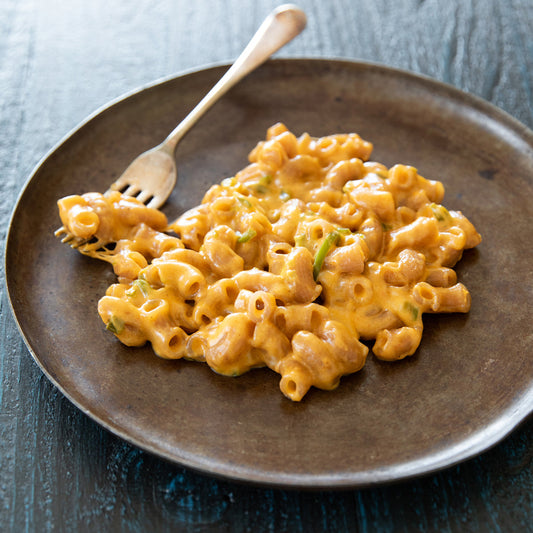 Jovial Grain Free Cassava Elbows pasta in a bowl, showcasing the gluten-free, cassava-based pasta shape for healthy cooking.