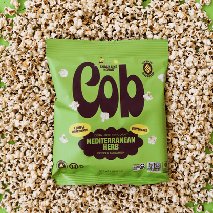 Cob Foods Mediterranean Herb Popped Sorghum in a bowl, showcasing crunchy, herb-seasoned popped sorghum pieces.